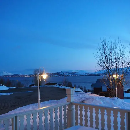In The Spot Of The Midnight Sun And Aurora Borealis. Movik (Troms)